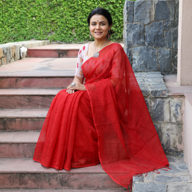 Red Nazaakat Kota Doria Cotton Plain Saree with Blouse & Jewellery Set, draped and worn by a woman, AI visual of the saree, iTokri