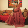 Red Nazaakat Kota Doria Cotton Plain Saree with Blouse & Jewellery Set, draped and worn by a woman, AI visual of the saree, iTokri