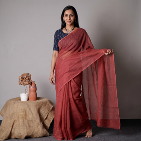Red Nazaakat Kota Doria Cotton Plain Saree with Blouse & Jewellery Set, draped and worn by a woman, AI visual of the saree, iTokri