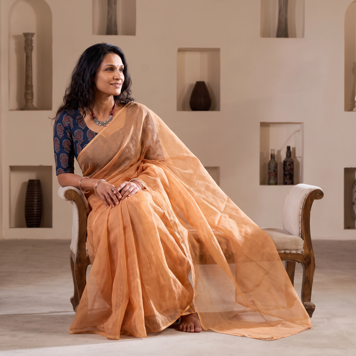 Peach Nazaakat Kota Doria Cotton Plain Saree with Blouse & Jewellery Set, draped and worn by a woman, AI visual of the saree, iTokri