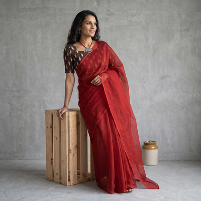 Red Nazaakat Kota Doria Cotton Plain Saree with Blouse & Jewellery Set, draped and worn by a woman, AI visual of the saree, iTokri