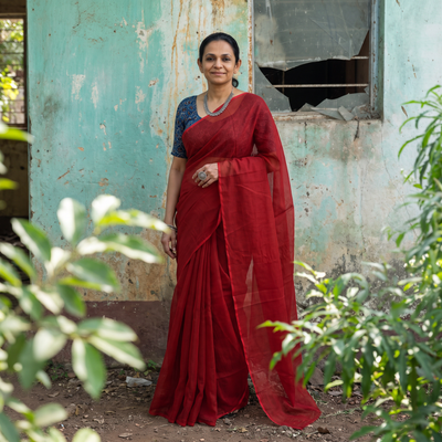 Red Nazaakat Kota Doria Cotton Plain Saree with Blouse & Jewellery Set, draped and worn by a woman, AI visual of the saree, iTokri