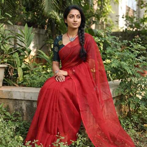 Red Nazaakat Kota Doria Cotton Plain Saree with Blouse & Jewellery Set, draped and worn by a woman, AI visual of the saree, iTokri