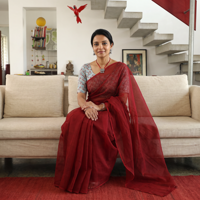 Red Nazaakat Kota Doria Cotton Plain Saree with Blouse & Jewellery Set, draped and worn by a woman, AI visual of the saree, iTokri