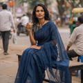 Blue Nazaakat Kota Doria Cotton Plain Saree with Blouse & Jewellery Set, draped and worn by a woman, AI visual of the saree, iTokri