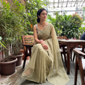 Green Nazaakat Kota Doria Cotton Plain Saree with Blouse & Jewellery Set, draped and worn by a woman, AI visual of the saree, iTokri
