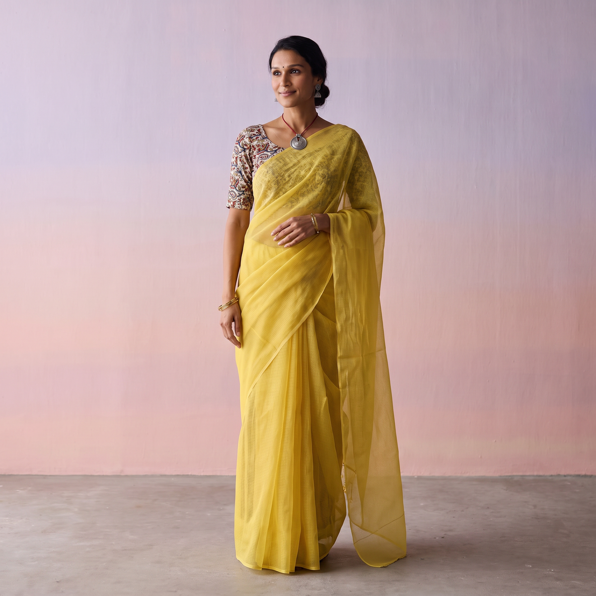 Yellow Nazaakat Kota Doria Cotton Plain Saree with Blouse & Jewellery Set, draped and worn by a woman, AI visual of the saree, iTokri