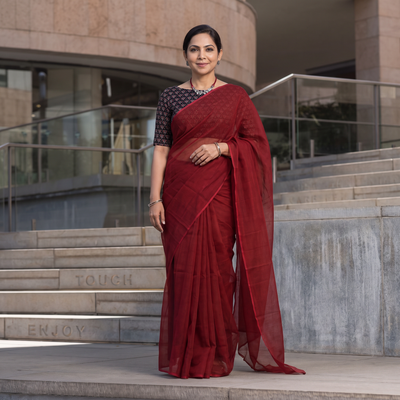 Red Nazaakat Kota Doria Cotton Plain Saree with Blouse & Jewellery Set, draped and worn by a woman, AI visual of the saree, iTokri