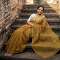 Yellow Nazaakat Kota Doria Cotton Plain Saree with Blouse & Jewellery Set, draped and worn by a woman, AI visual of the saree, iTokri