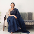 Blue Nazaakat Kota Doria Cotton Plain Saree with Blouse & Jewellery Set, draped and worn by a woman, AI visual of the saree, iTokri