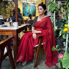 Red Nazaakat Kota Doria Cotton Plain Saree with Blouse & Jewellery Set, draped and worn by a woman, AI visual of the saree, iTokri