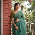Green Nazaakat Kota Doria Cotton Plain Saree with Blouse & Jewellery Set, draped and worn by a woman, AI visual of the saree, iTokri