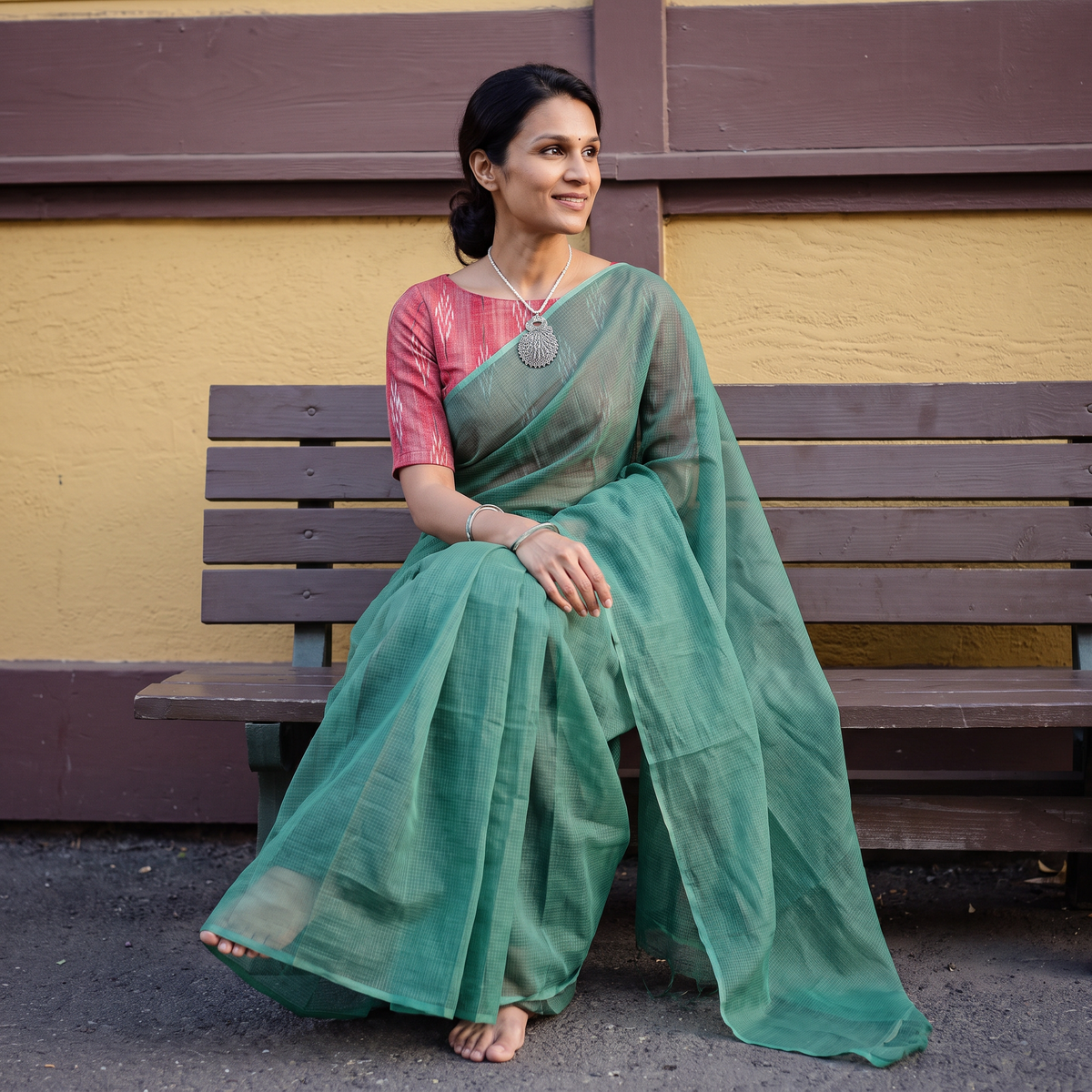 Green Nazaakat Kota Doria Cotton Plain Saree with Blouse & Jewellery Set, draped and worn by a woman, AI visual of the saree, iTokri
