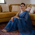 Blue Nazaakat Kota Doria Cotton Plain Saree with Blouse & Jewellery Set, draped and worn by a woman, AI visual of the saree, iTokri