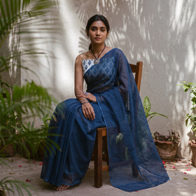 Blue Nazaakat Kota Doria Cotton Plain Saree with Blouse & Jewellery Set, draped and worn by a woman, AI visual of the saree, iTokri