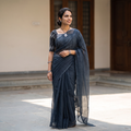 Grey Nazaakat Kota Doria Cotton Plain Saree with Blouse & Jewellery Set, draped and worn by a woman, AI visual of the saree, iTokri