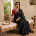 Black Nazaakat Kota Doria Cotton Plain Saree with Blouse & Jewellery Set, draped and worn by a woman, AI visual of the saree, iTokri