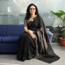 Black Nazaakat Kota Doria Cotton Plain Saree with Blouse & Jewellery Set, draped and worn by a woman, AI visual of the saree, iTokri