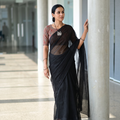 Black Nazaakat Kota Doria Cotton Plain Saree with Blouse & Jewellery Set, draped and worn by a woman, AI visual of the saree, iTokri