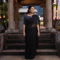 Black Nazaakat Kota Doria Cotton Plain Saree with Blouse & Jewellery Set, draped and worn by a woman, AI visual of the saree, iTokri
