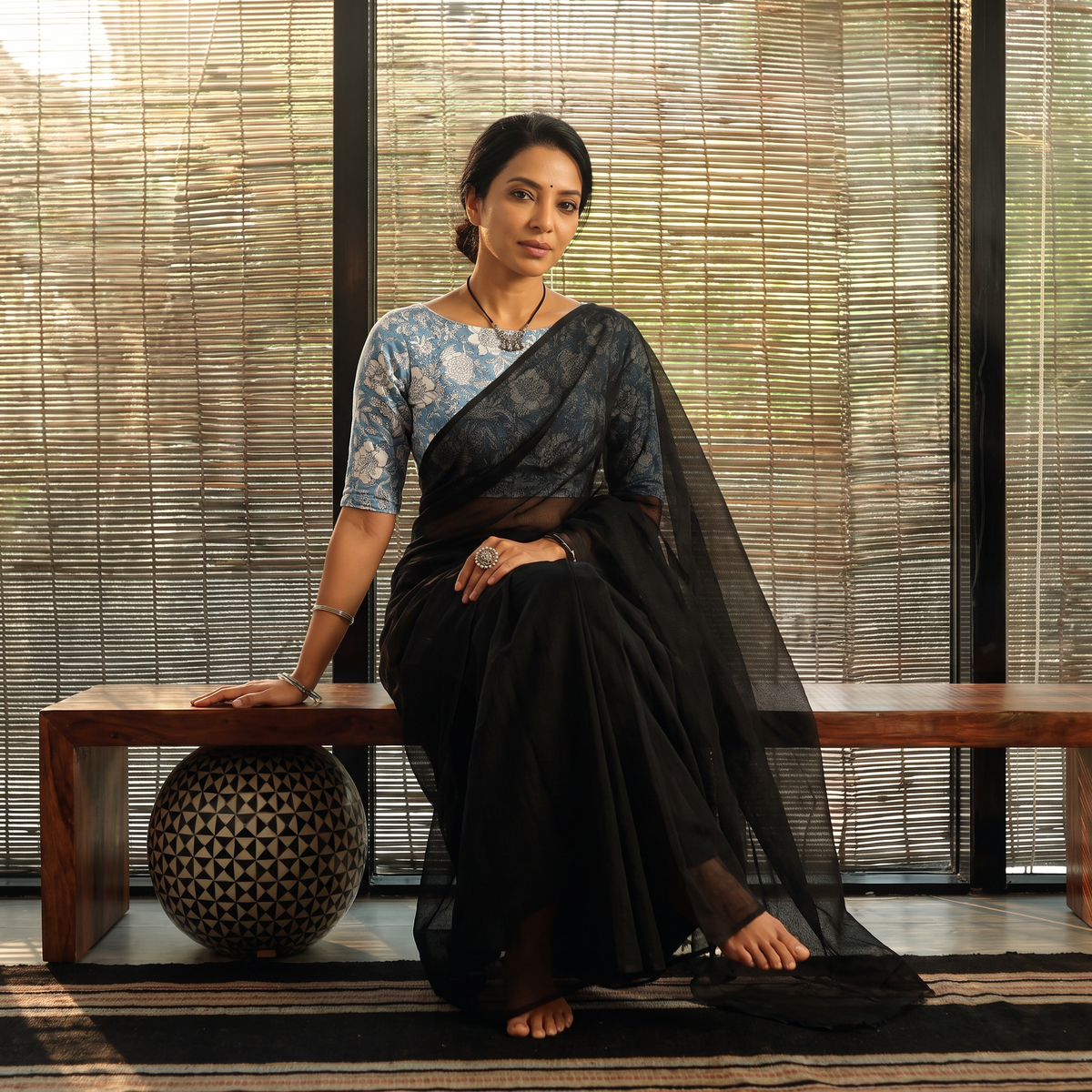 Black Nazaakat Kota Doria Cotton Plain Saree with Blouse & Jewellery Set, draped and worn by a woman, AI visual of the saree, iTokri