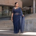 Blue Nazaakat Kota Doria Cotton Plain Saree with Blouse & Jewellery Set, draped and worn by a woman, AI visual of the saree, iTokri