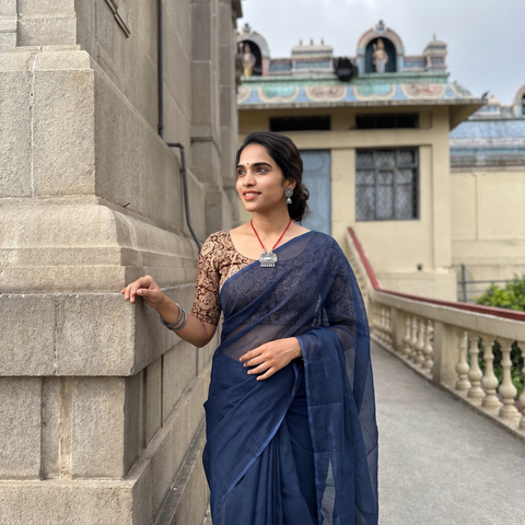 Blue Nazaakat Kota Doria Cotton Plain Saree with Blouse & Jewellery Set, draped and worn by a woman, AI visual of the saree, iTokri