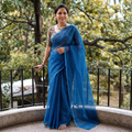 Blue Nazaakat Kota Doria Cotton Plain Saree with Blouse & Jewellery Set, draped and worn by a woman, AI visual of the saree, iTokri