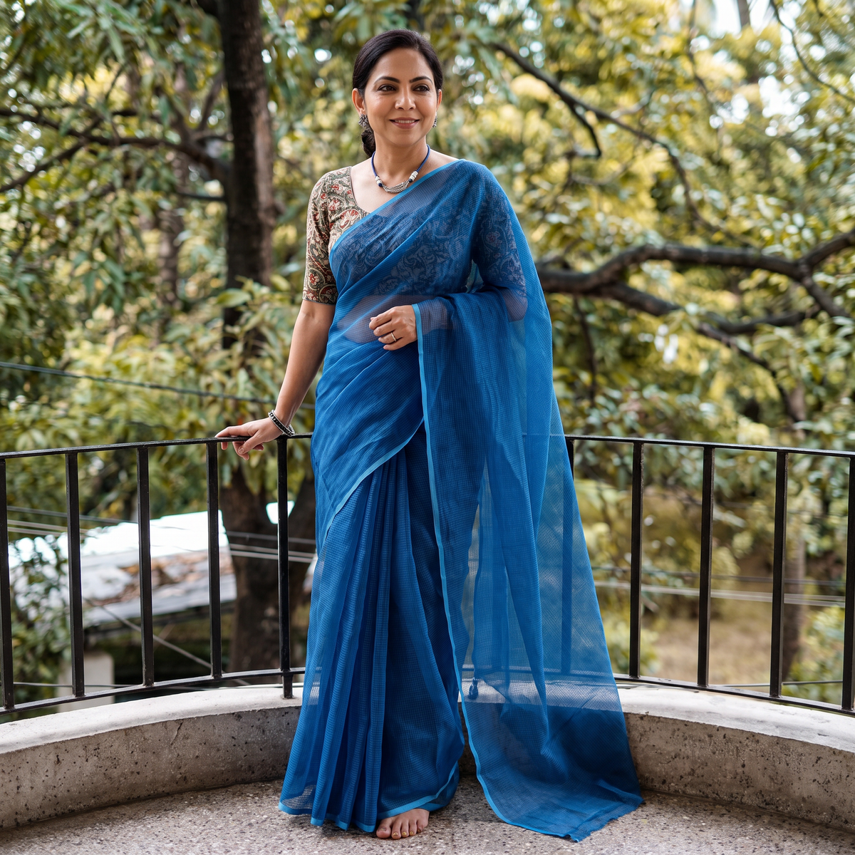 Blue Nazaakat Kota Doria Cotton Plain Saree with Blouse & Jewellery Set, draped and worn by a woman, AI visual of the saree, iTokri
