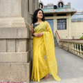 Yellow Nazaakat Kota Doria Cotton Plain Saree with Blouse & Jewellery Set, draped and worn by a woman, AI visual of the saree, iTokri