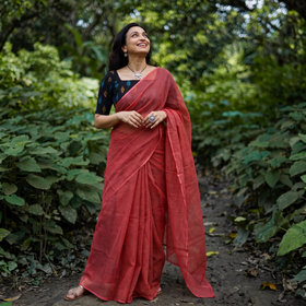 Red Nazaakat Kota Doria Cotton Plain Saree with Blouse & Jewellery Set, draped and worn by a woman, AI visual of the saree, iTokri
