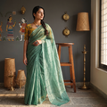 Green Nazaakat Kota Doria Cotton Plain Saree with Blouse & Jewellery Set, draped and worn by a woman, AI visual of the saree, iTokri