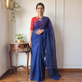 Blue Nazaakat Kota Doria Cotton Plain Saree with Blouse & Jewellery Set, draped and worn by a woman, AI visual of the saree, iTokri