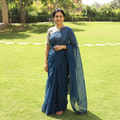 Blue Nazaakat Kota Doria Cotton Plain Saree with Blouse & Jewellery Set, draped and worn by a woman, AI visual of the saree, iTokri