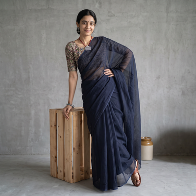Blue Nazaakat Kota Doria Cotton Plain Saree with Blouse & Jewellery Set, draped and worn by a woman, AI visual of the saree, iTokri