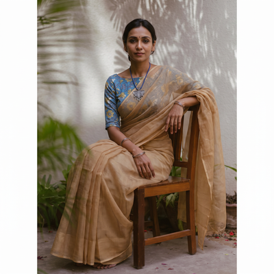 Beige Nazaakat Kota Doria Cotton Plain Saree with Blouse & Jewellery Set, draped and worn by a woman, AI visual of the saree, iTokri