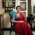 Red Nazaakat Kota Doria Cotton Plain Saree with Blouse & Jewellery Set, draped and worn by a woman, AI visual of the saree, iTokri