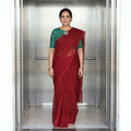Red Nazaakat Kota Doria Cotton Plain Saree with Blouse & Jewellery Set, draped and worn by a woman, AI visual of the saree, iTokri