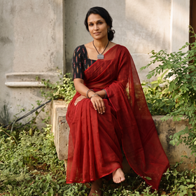 Red Nazaakat Kota Doria Cotton Plain Saree with Blouse & Jewellery Set, draped and worn by a woman, AI visual of the saree, iTokri
