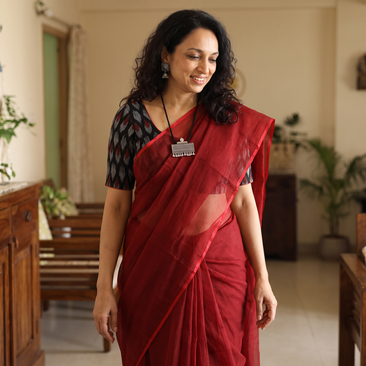 Red Nazaakat Kota Doria Cotton Plain Saree with Blouse & Jewellery Set, draped and worn by a woman, AI visual of the saree, iTokri