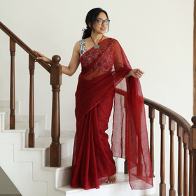 Red Nazaakat Kota Doria Cotton Plain Saree with Blouse & Jewellery Set, draped and worn by a woman, AI visual of the saree, iTokri