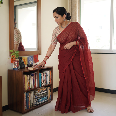 Maroon Nazaakat Kota Doria Cotton Plain Saree with Blouse Piece & Earrings, draped and worn by a woman, AI visual of the saree, iTokri