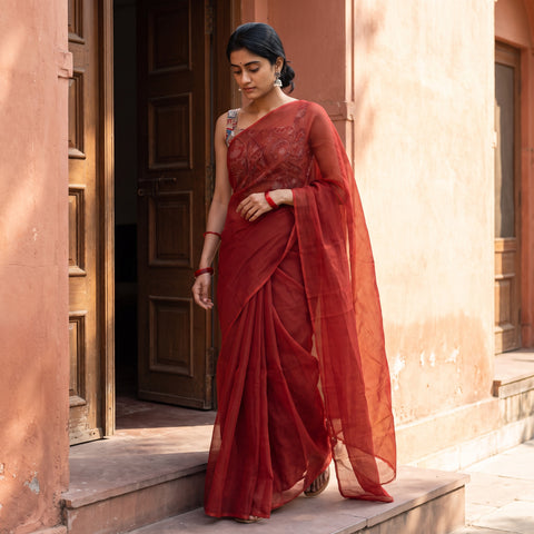 Maroon Nazaakat Kota Doria Cotton Plain Saree with Blouse Piece & Earrings, draped and worn by a woman, AI visual of the saree, iTokri