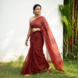 Maroon Nazaakat Kota Doria Cotton Plain Saree with Blouse Piece & Earrings, draped and worn by a woman, AI visual of the saree, iTokri