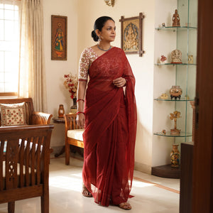 Maroon Nazaakat Kota Doria Cotton Plain Saree with Blouse Piece & Earrings, draped and worn by a woman, AI visual of the saree, iTokri