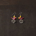 Noor german silver jhumki earrings with wooden bird