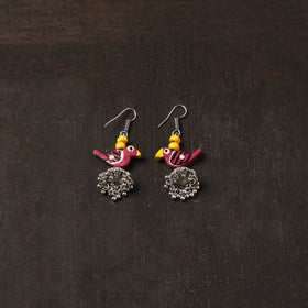 Noor german silver jhumki earrings with wooden bird