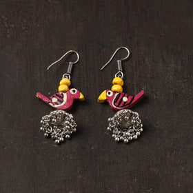 Noor german silver jhumki earrings with wooden bird