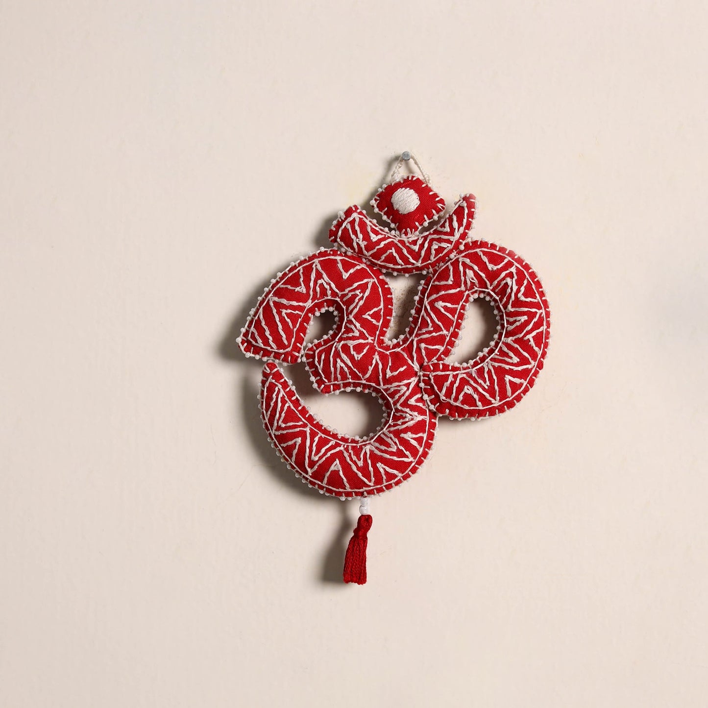 Om - aipan art hand embroidered hanging 01 - handcrafted