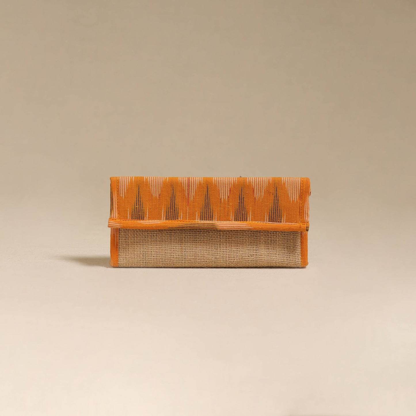 Orange - handcrafted ikat fabric jute clutch / wallet